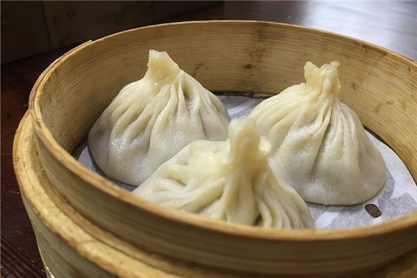 孕婦夢見吃包子_周公解夢 孕婦夢見吃包子是什麼意思_孕婦夢見吃包子好不好_周公解夢官網